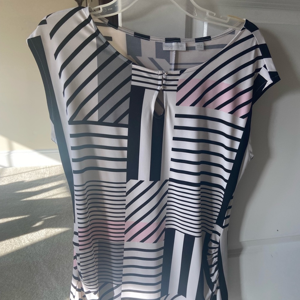 Cute top for going out or work.